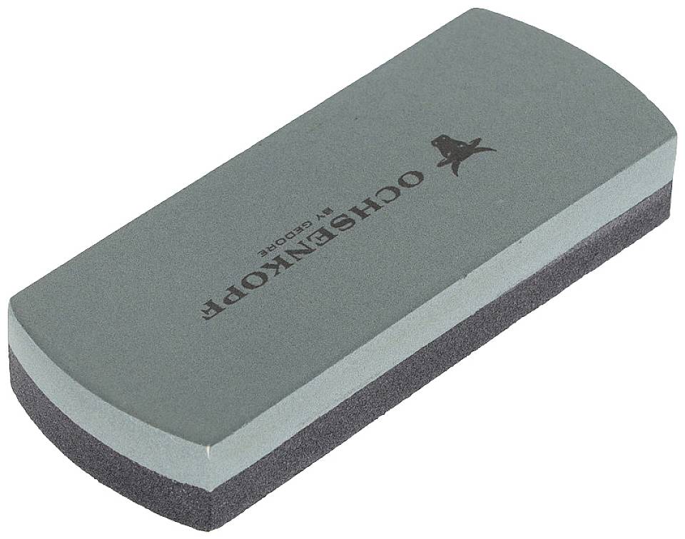 Grey grinding stone with bevelled sides and the inscription 'OCHSENKOPF by GEDORE' on the top surface.