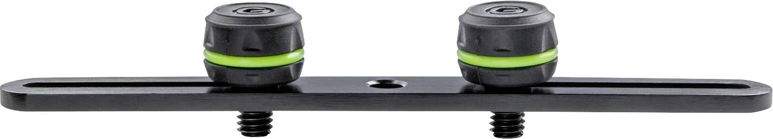 A black, elongated holder with two black, ribbed buttons featuring green rings, and a central mounting aperture.