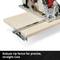 A circular hand saw cuts wood with a robust parallel guide, which enables precise and parallel cuts.