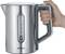 Silver electric kettle with a viewing window, held by a hand. Water level is printed on the side. Brand name visible.