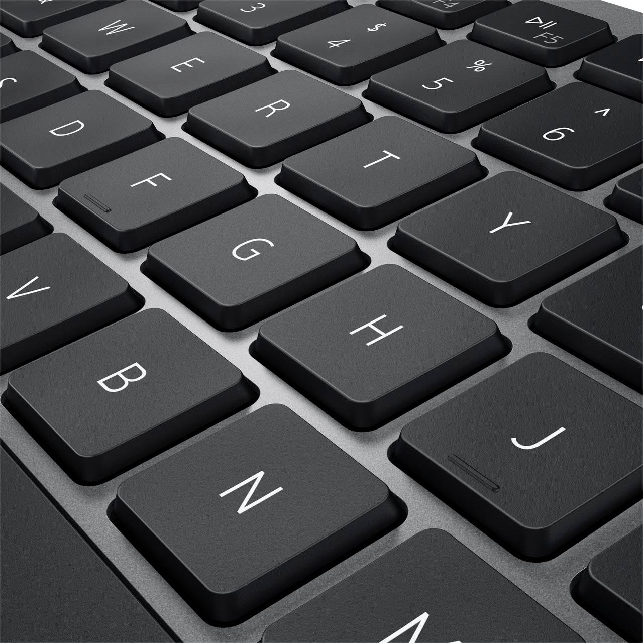 Close-up of a black QWERTZ keyboard showing several keys, including letter and number keys.