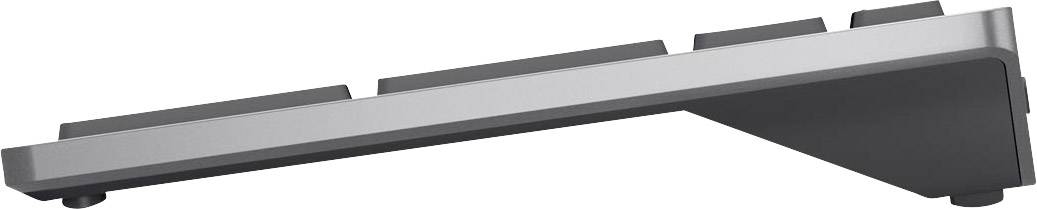 Profile view of a slim, wireless computer keyboard with an angled design.