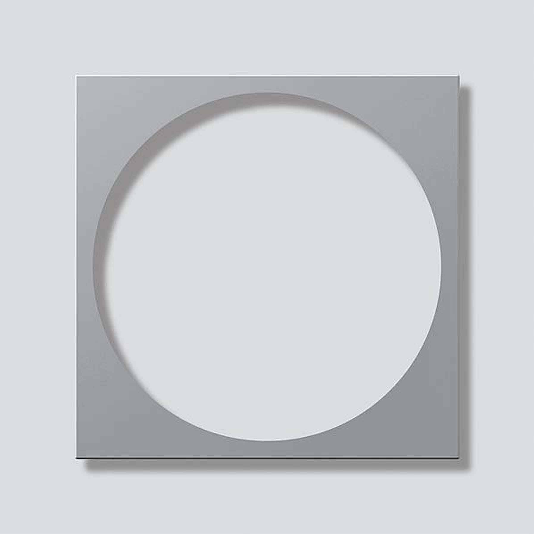 Abstract artwork with a square and circle in grey tones. Circle is centrally positioned within the square. Minimalist design without additional details.