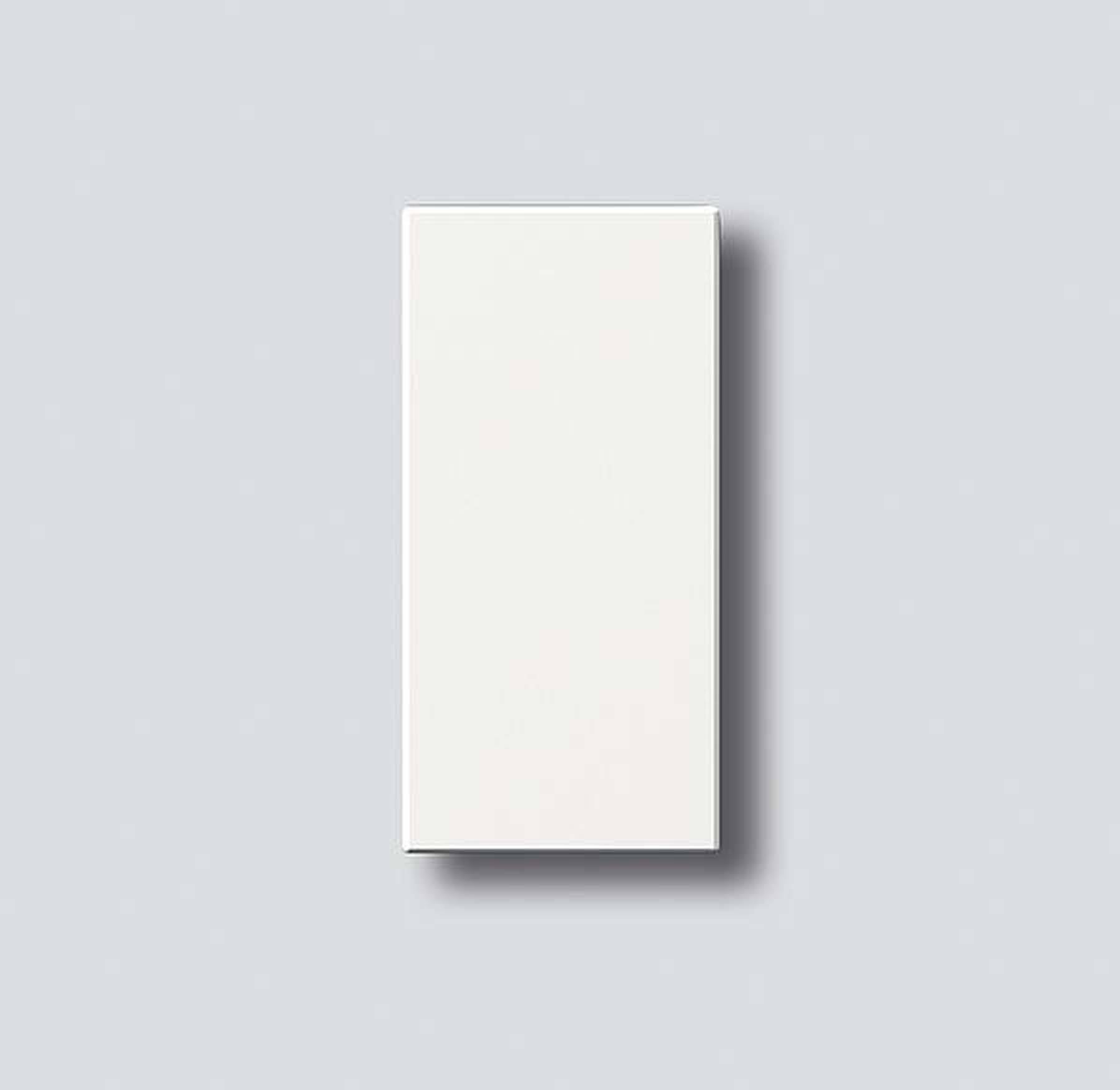 A white, rectangular envelope lies on a light grey background. It casts a subtle shadow towards the bottom right.