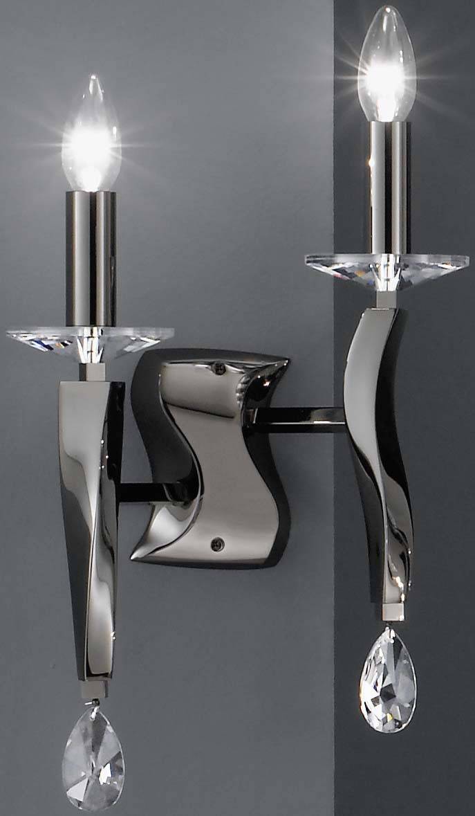 Wall light with two candle lamps, gleaming metal, crystal embellishments, luminous. Modern style, mounted on a grey wall.