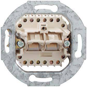 A double telephone socket mounted on a wall shows two slots and copper contacts for cable connections.