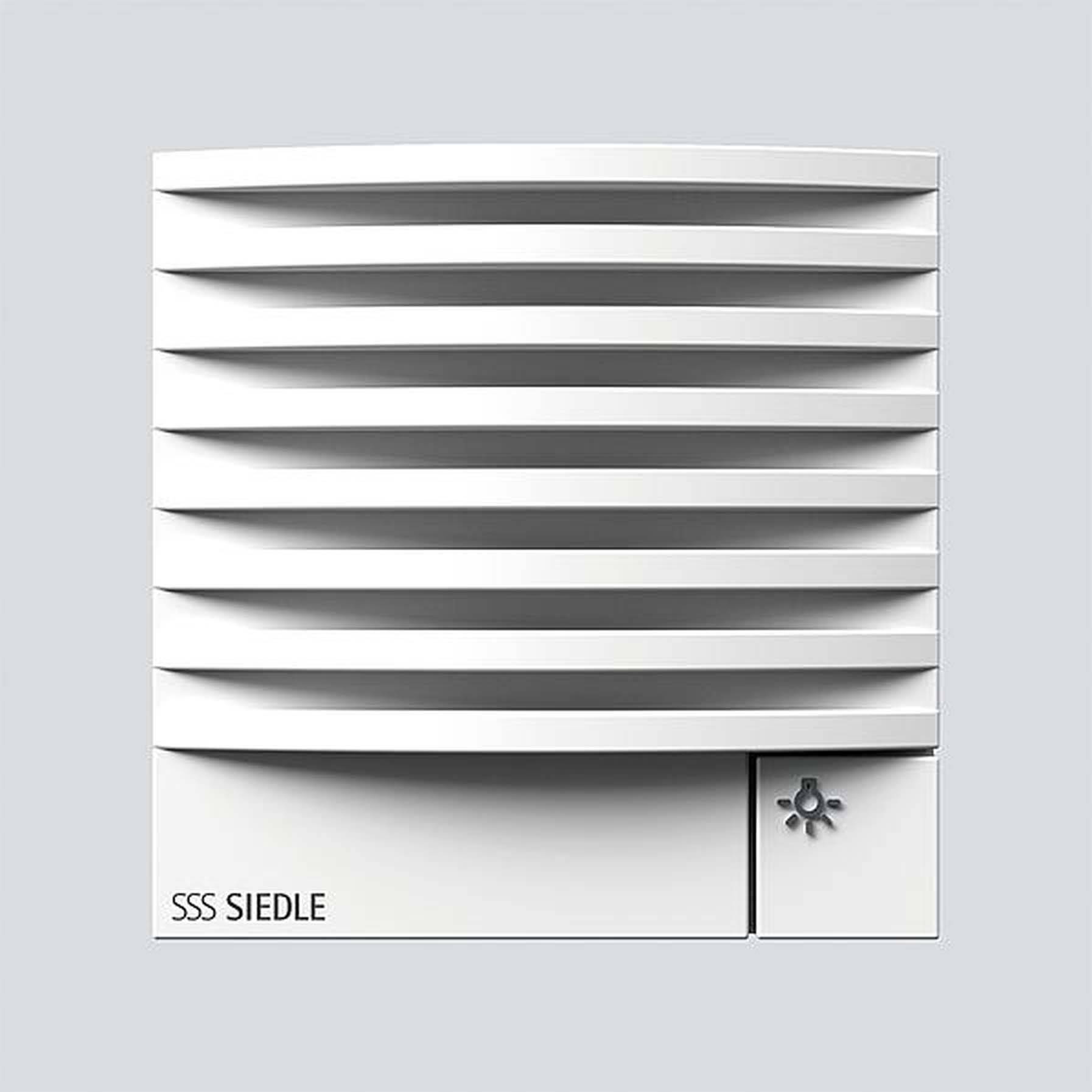 White Siedle intercom system with horizontal ventilation slots on a grey background. The Siedle logo is positioned in the bottom left.