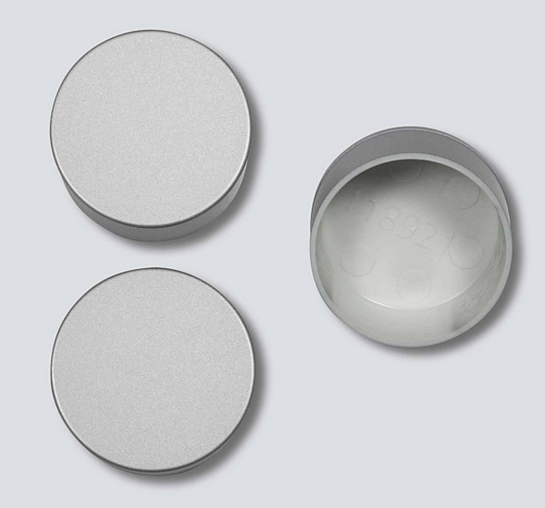 Three round, silver metal containers. Two with lids, one open, showing an internal number '18291'. On a grey background.