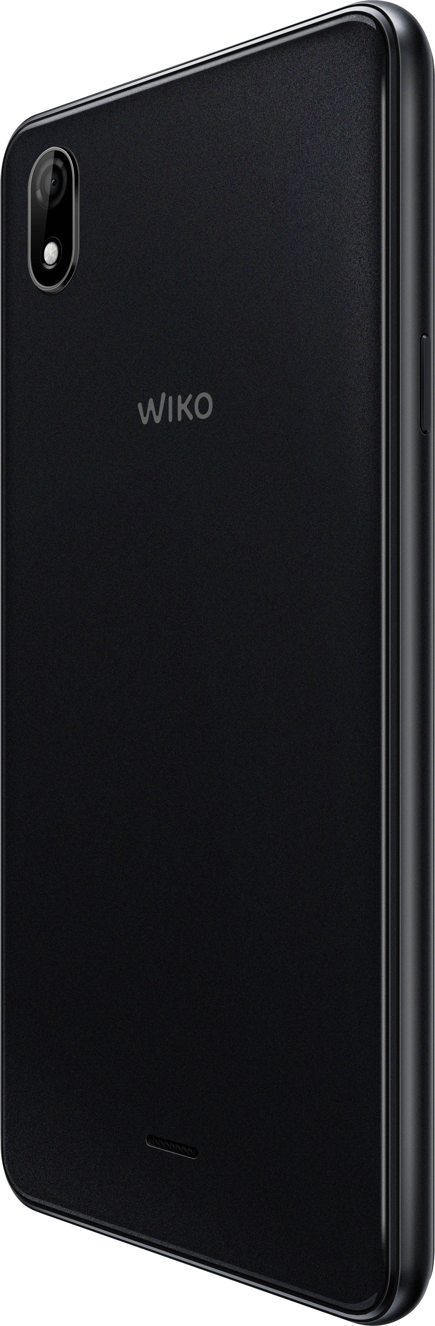 A black Wiko smartphone, viewed from the back, with a camera in the top left corner.