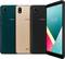 Three Wiko smartphones in different colours (green, gold, black) positioned side by side, front and back views visible.