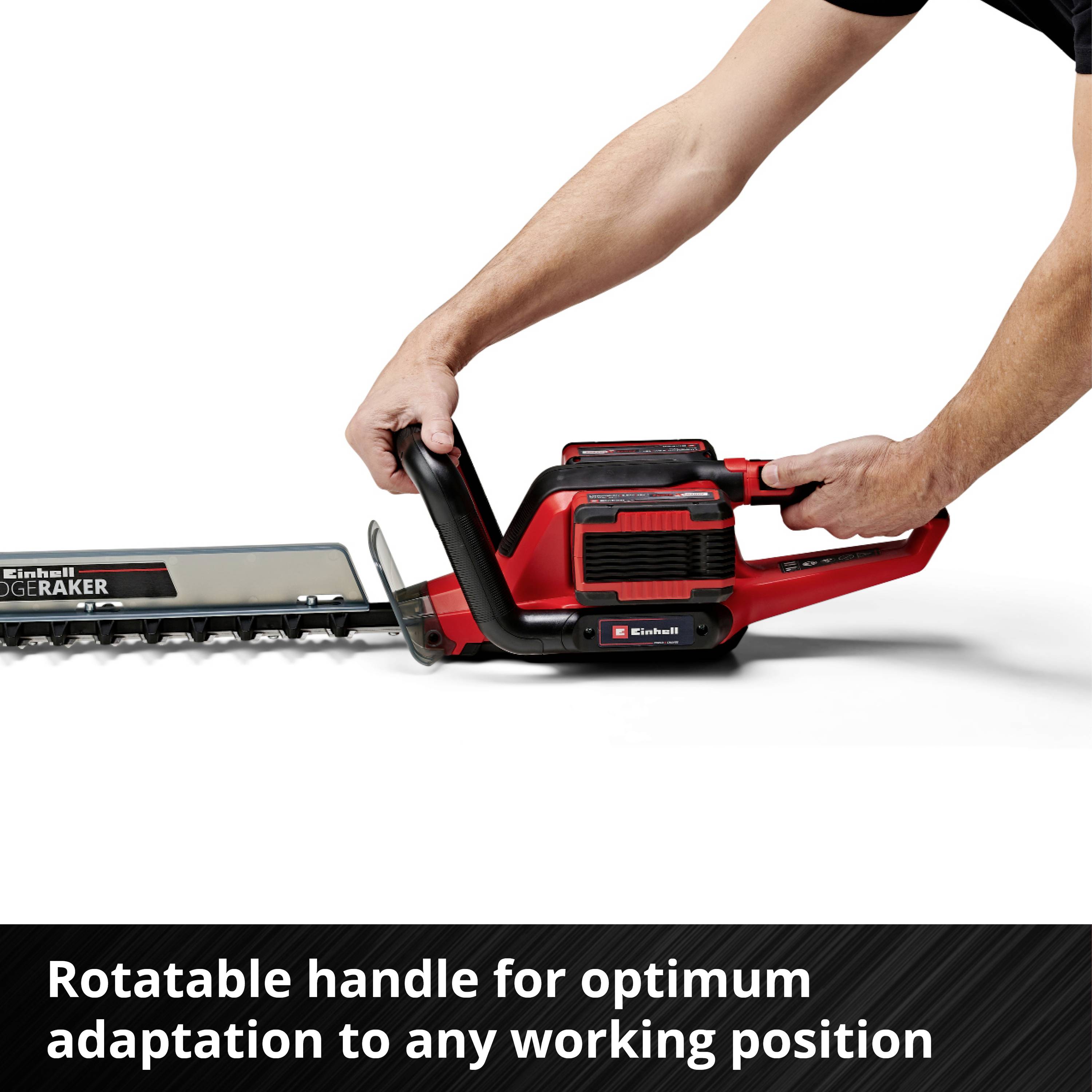 A red battery-powered hedge trimmer with a rotating handle, held by a person. Text: 'Rotating handle for optimal adjustment to any working position'.