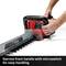Einhell Hedge Trimmer with Narrow Front Handle and Micro-Switch. Hands holding the hedge, emphasising comfortable handling.