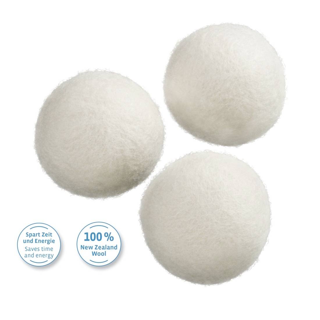 Three white dryer balls made from 100% New Zealand wool; label text: 'Saves time and energy'.