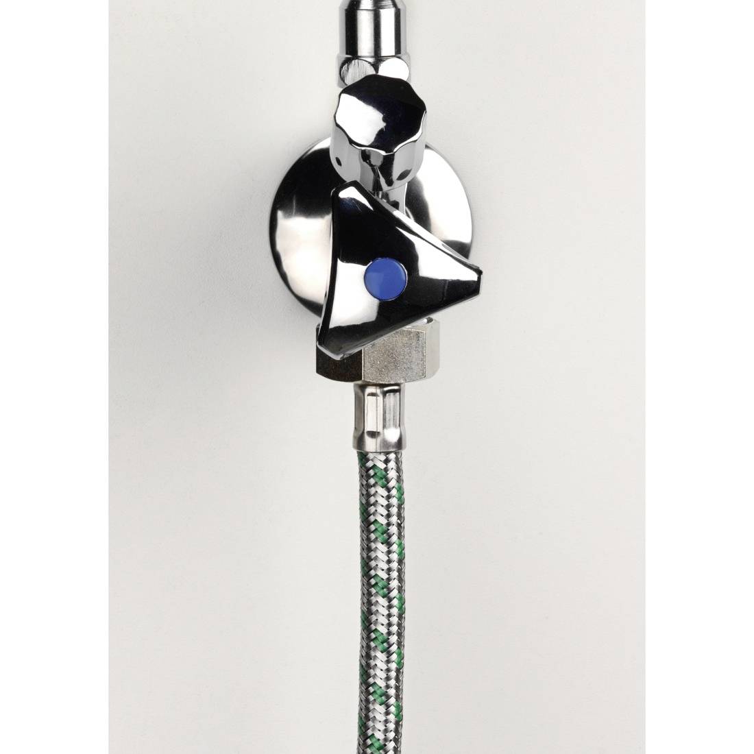 A gleaming tap with a blue-marked lever is mounted on a wall. A hose with a green and white pattern hangs beneath it.