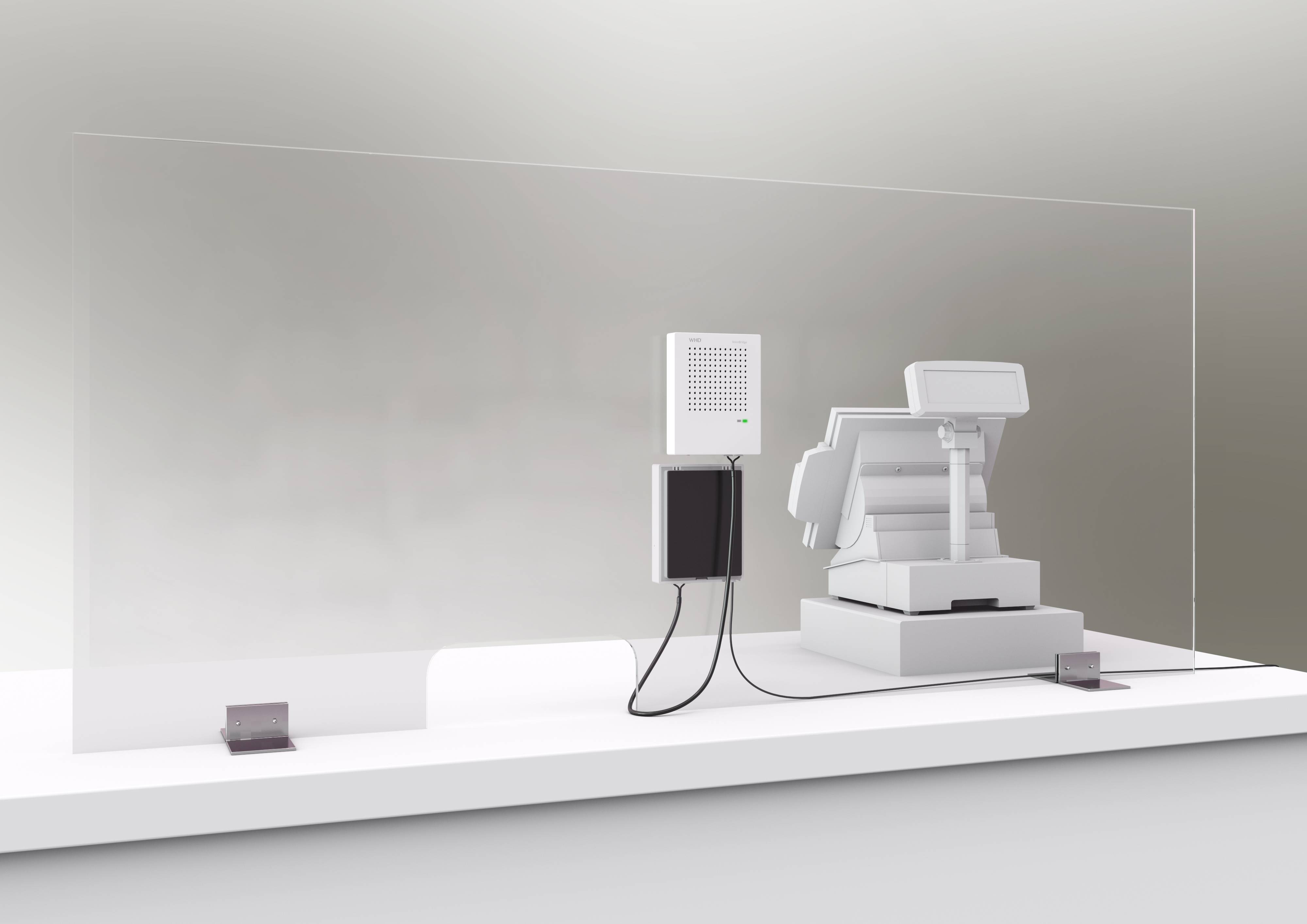 A perspex screen separates a white till from a speaker and microphone used for communication.