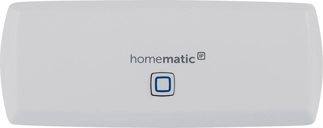 A rectangular, white device with 'homematic IP' printed on it and a central blue button. Used for home automation.