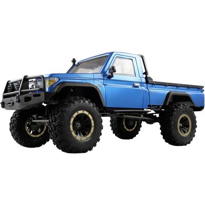 Blue off-road vehicle with large tyres, rugged design and increased ground clearance, suitable for challenging terrain.