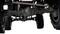 Underside view of a vehicle focusing on the axle and suspension, which appears robust and terrain-capable.