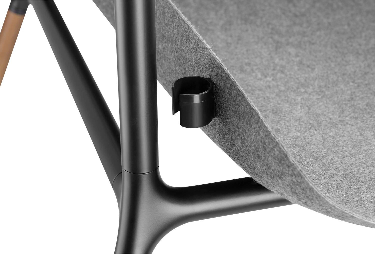 A grey chair with a black metal frame, showing a side-mounted fixing screw beneath the seat.