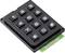 A black numeric keypad with keys ranging from 0 to 9, along with '*' and '#' symbols, is positioned at a slight angle.