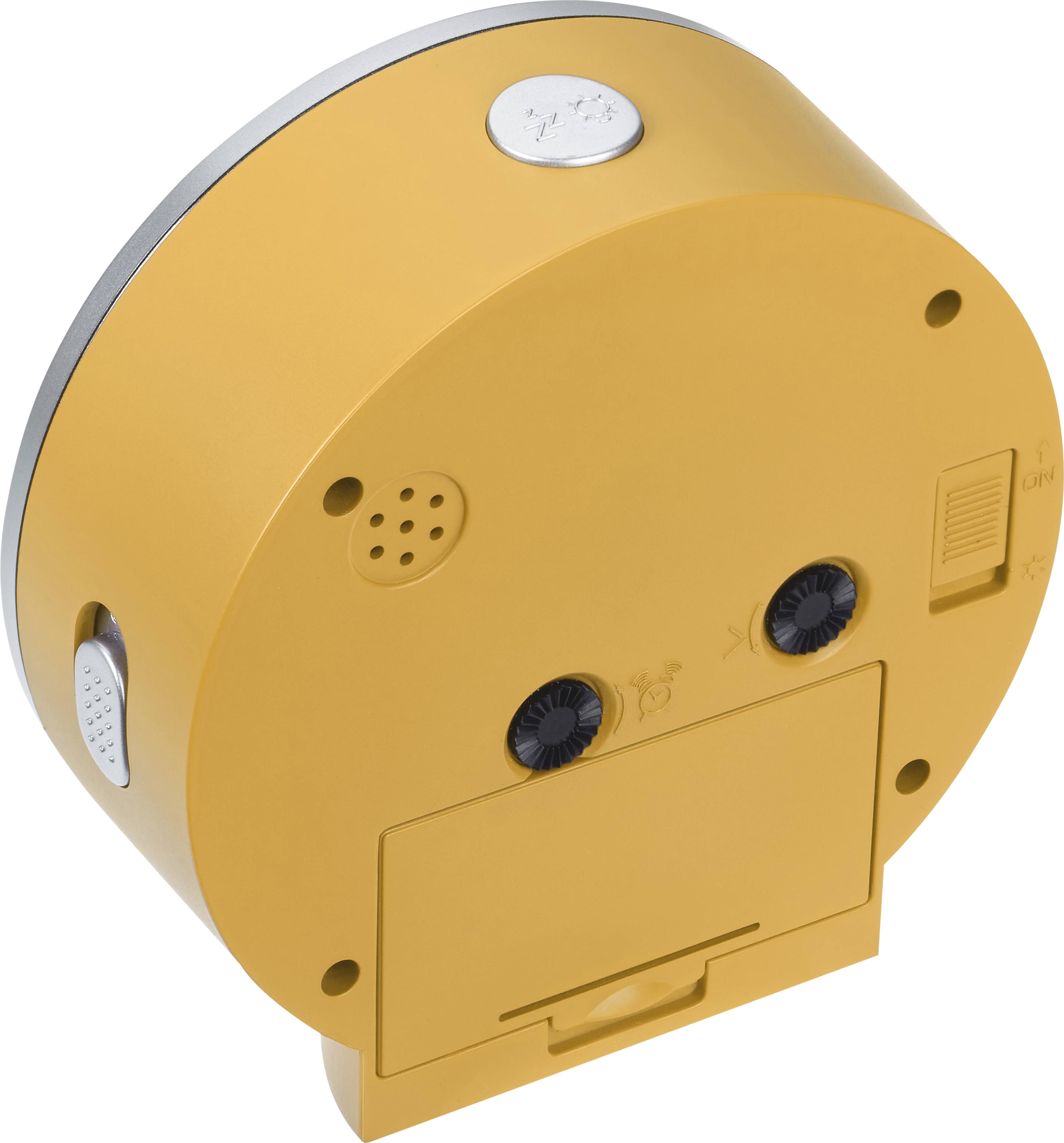 A yellow, round device with two black buttons and a small speaker opening. A silver switch is located on the top surface.