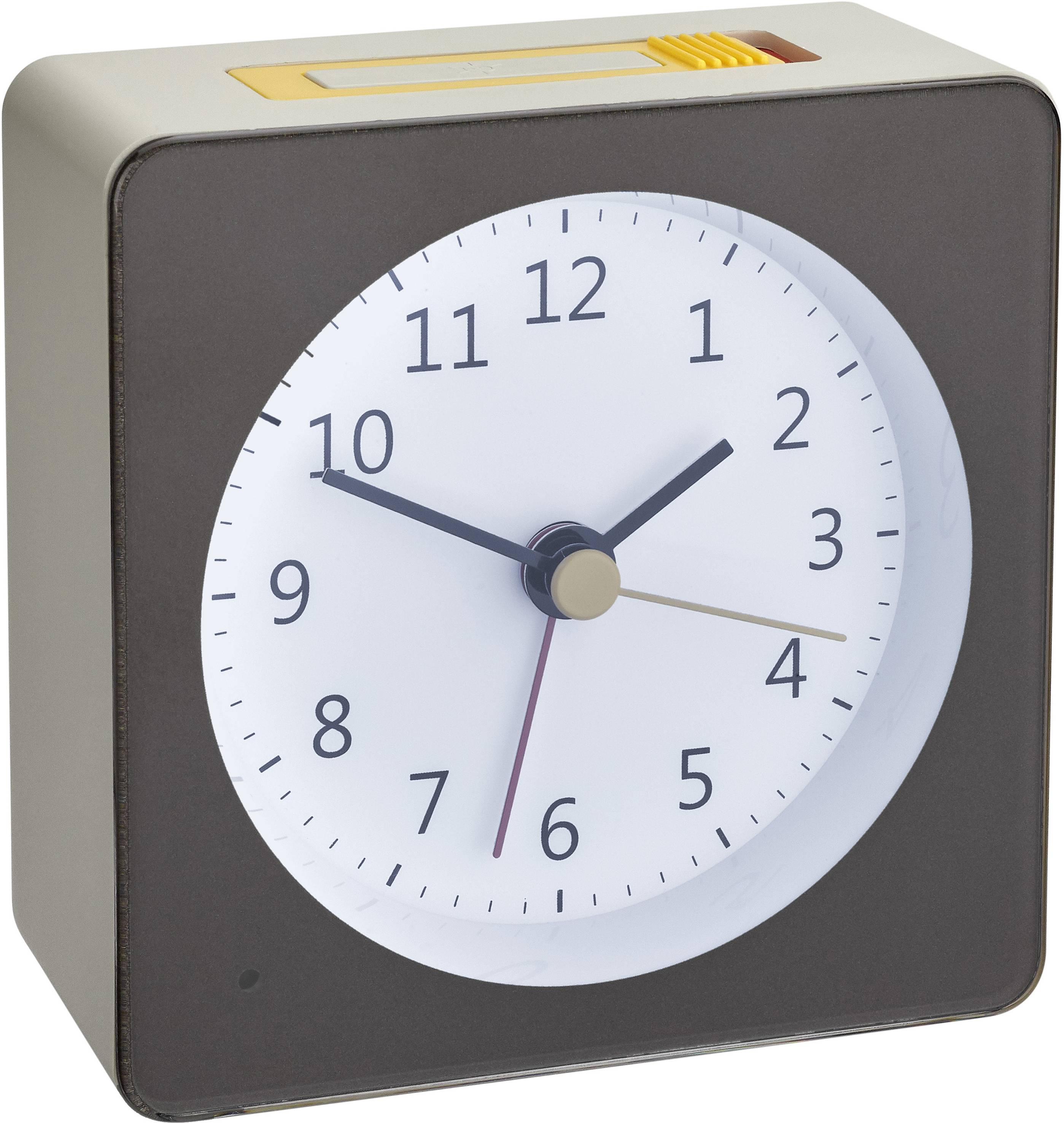 A square, analogue alarm clock with a white dial and black hands, showing 10:10. A yellow button is located at the top.