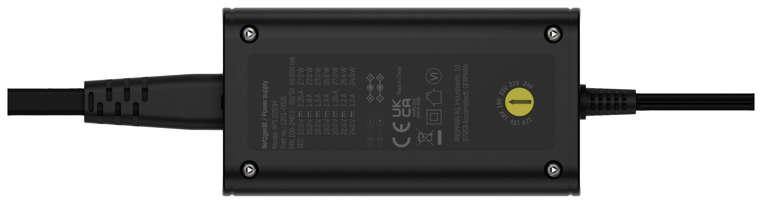 Black power supply with safety certifications and translation notes on the top surface. Cables extending from the left and right sides.