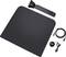 Black wireless charging station with foldable stand, USB cable, and mains adapter; suitable for various electronic devices.