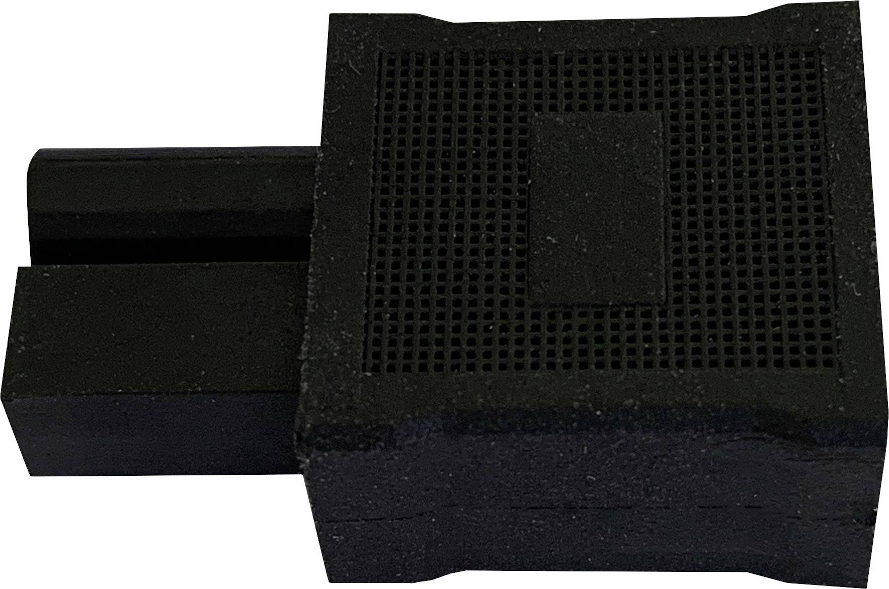 Black, rectangular, textured object with two elongated extensions on the left side; purpose unknown.