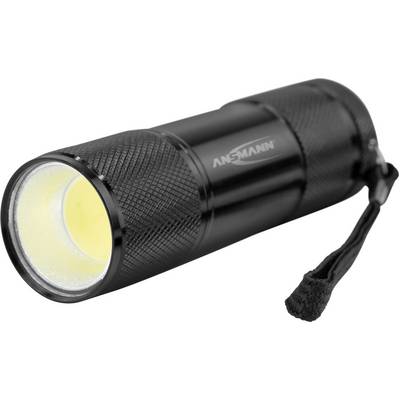Black handheld torch with a textured grip, yellow beam light, and hand strap at the back.