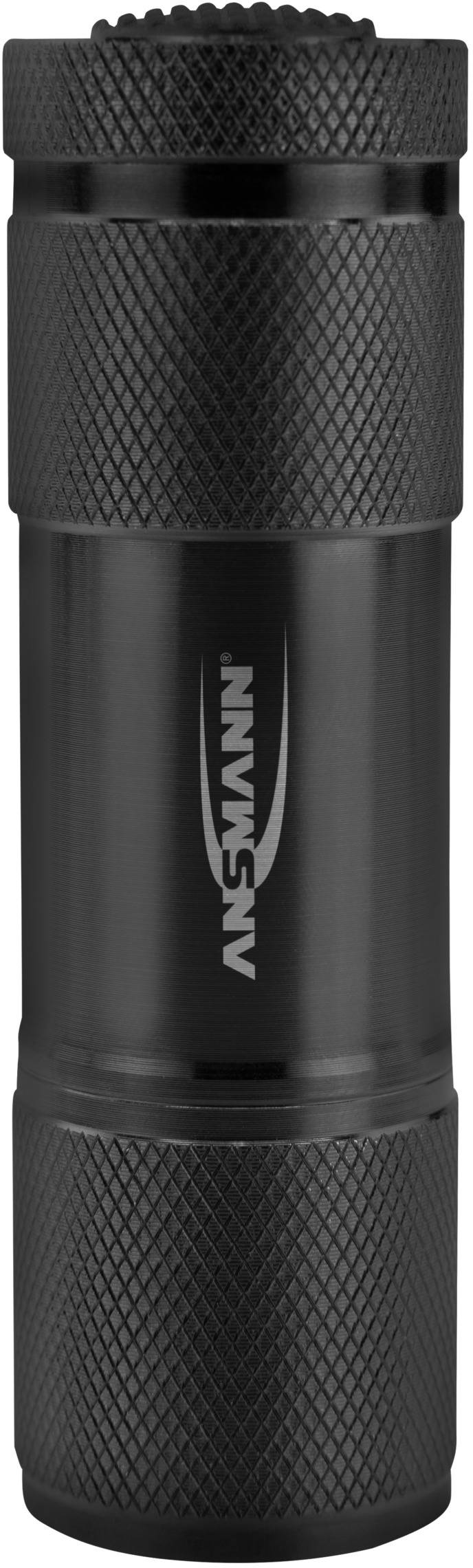 A black torch with a ribbed handle and the 'Ansmann' lettering on the casing.