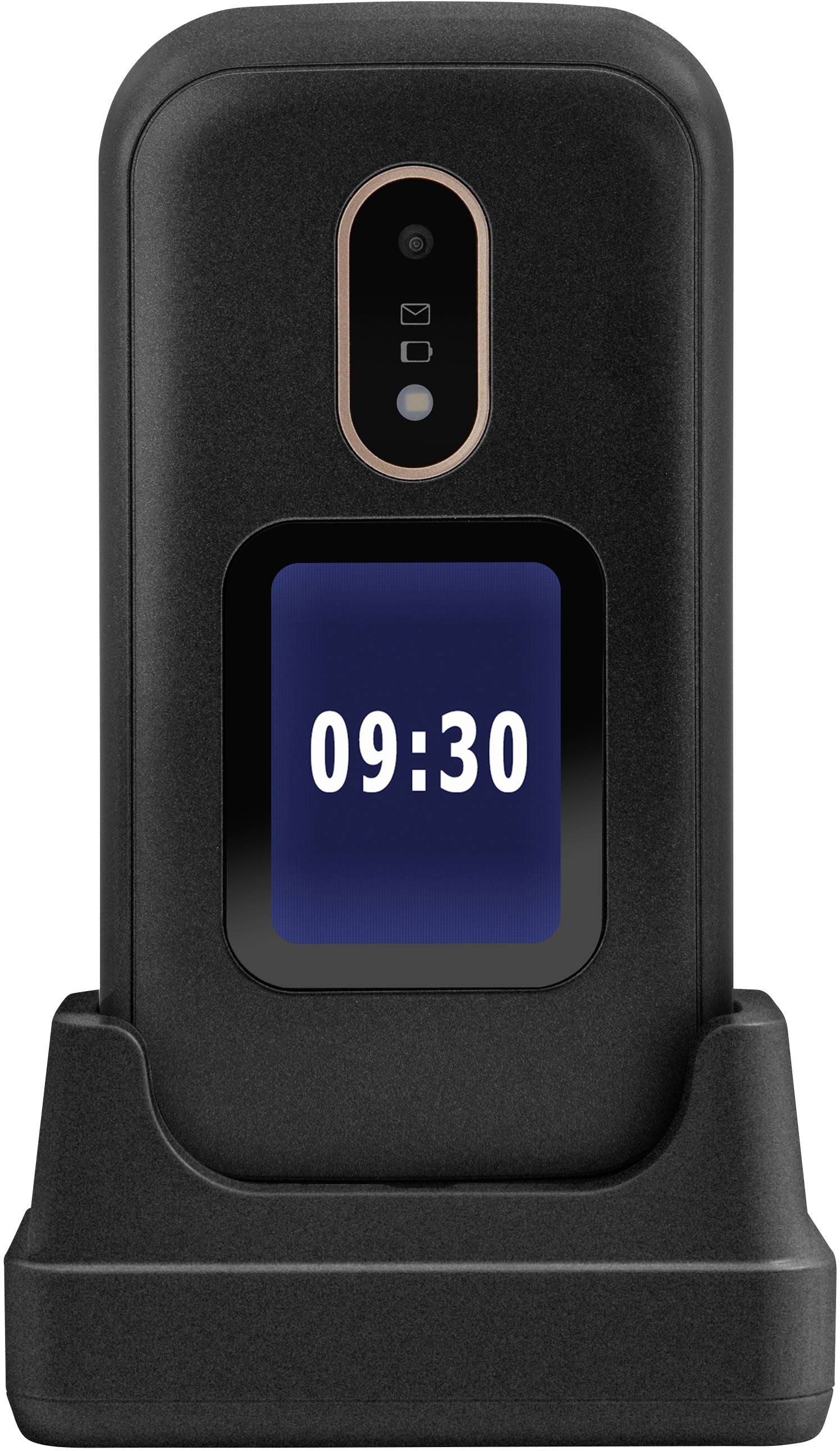 A closed flip phone in a charging station, displaying the time '09:30' on a small screen. It has a rear-facing camera.