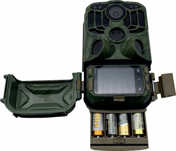 Wildlife camera with open battery compartment and screen. Two compartments showing batteries and setting options. Ideal for nature observation.