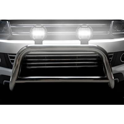 Front view of a car with two round headlights and a robust, gleaming bumper.