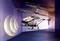 A remote-controlled helicopter with the inscription 'Missile Military' is flying in a blue space. The rotor blades are in motion.