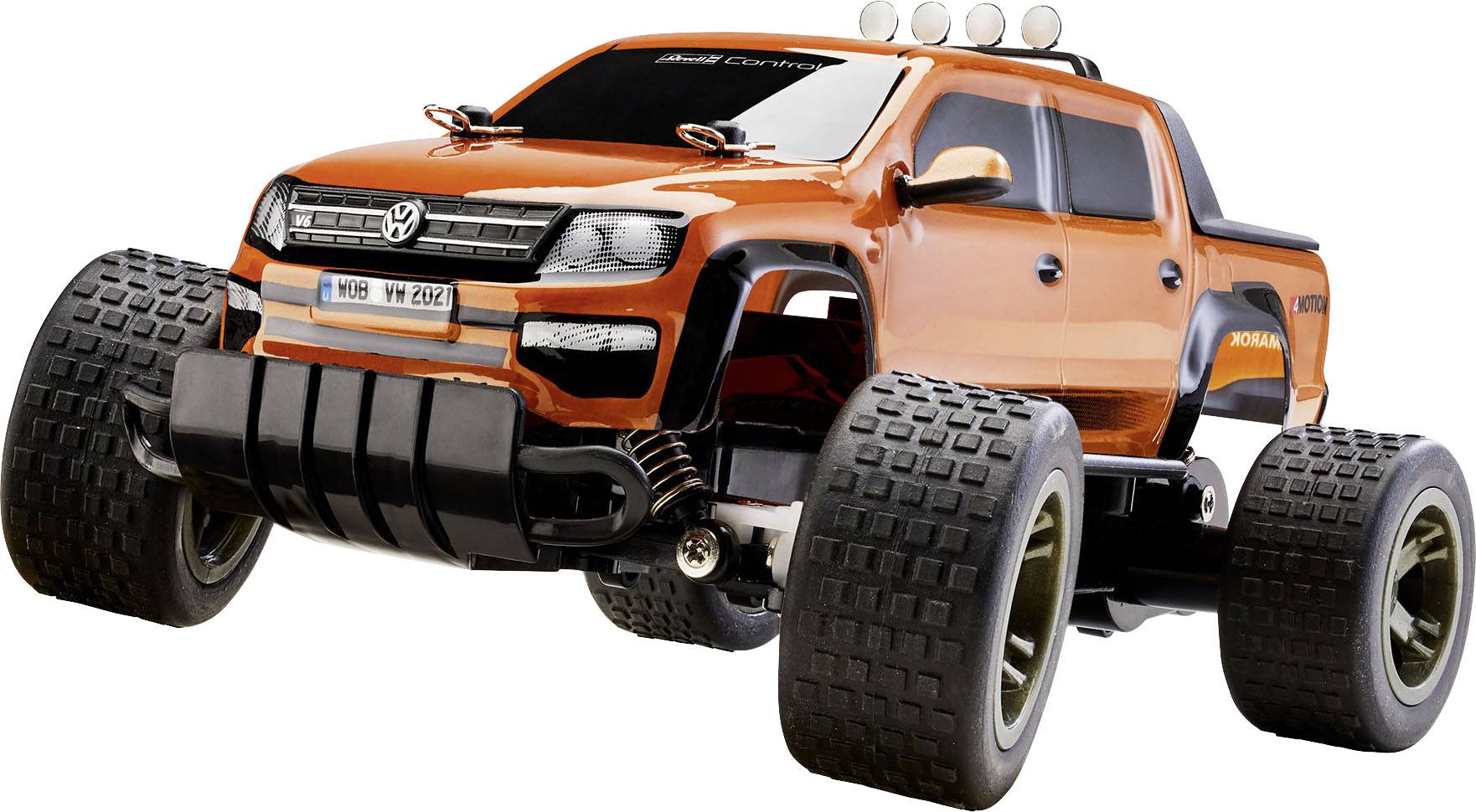 An orange toy car in an off-road style with large tyres and a detailed design.