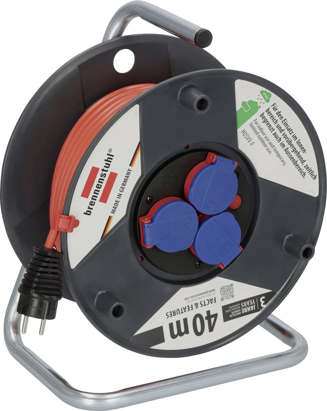 Portable orange extension cable reel with three blue covered sockets and a two-prong plug, shown on a metal stand<br>
