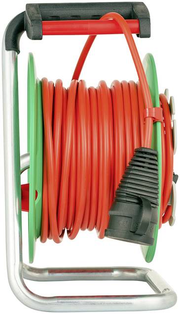 Red extension lead on a green cable reel with a black plug.