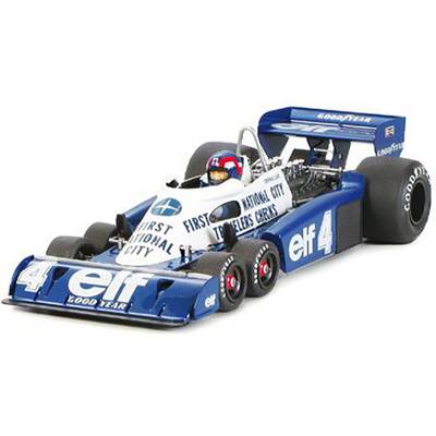A miniature model car of a blue racing car with six wheels, marked with 'elf', 'Goodyear' and other sponsor logos.