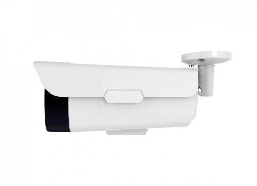 White surveillance camera with black front area, mounted sideways on the wall.