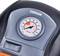 A pressure gauge on an air pump is showing just over 10 psi. The device is labelled 'OSRAM'.