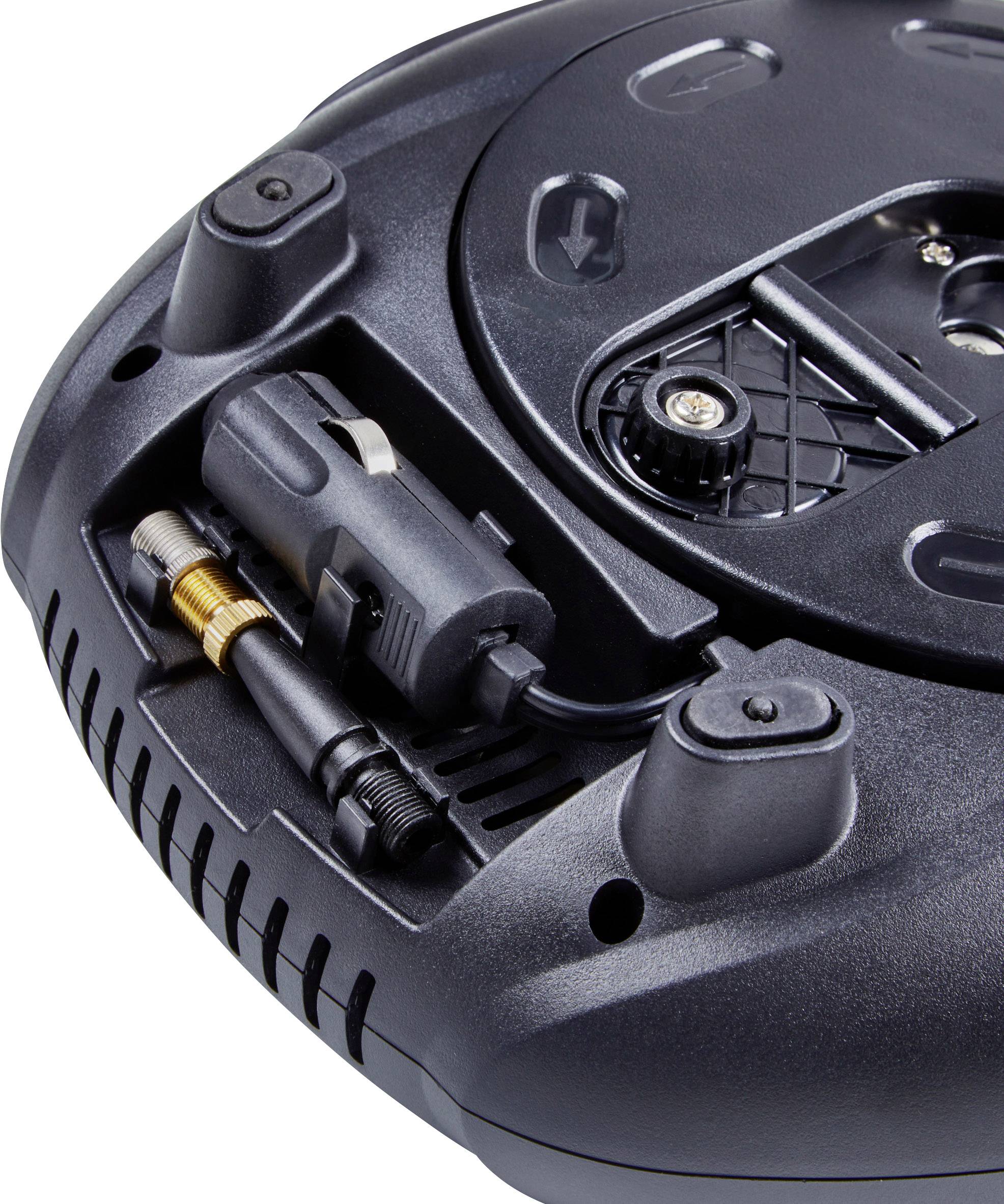 Underside of a black robotic vacuum cleaner with visible sensor and wheels.