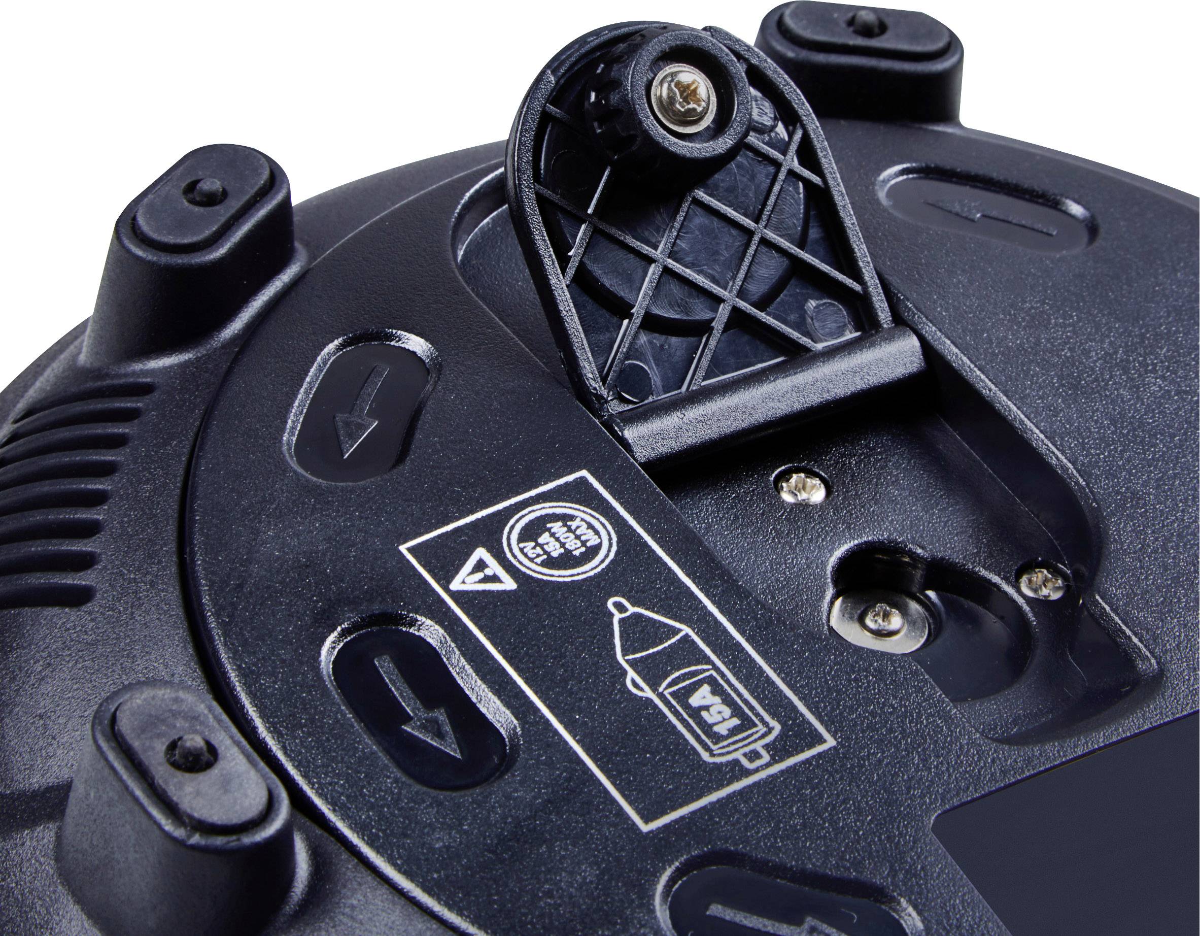 A part of a black device with a battery compartment and arrow symbols visible.