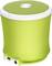 Green, portable speaker with white trim, featuring a volume control on the top. The underside shows power and audio connections.