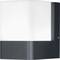 A modern wall light with a black base and a white, square lampshade. Ideal for exterior lighting.