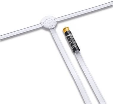 An electrical cable system with a connector and a black cylindrical component with an orange cap.