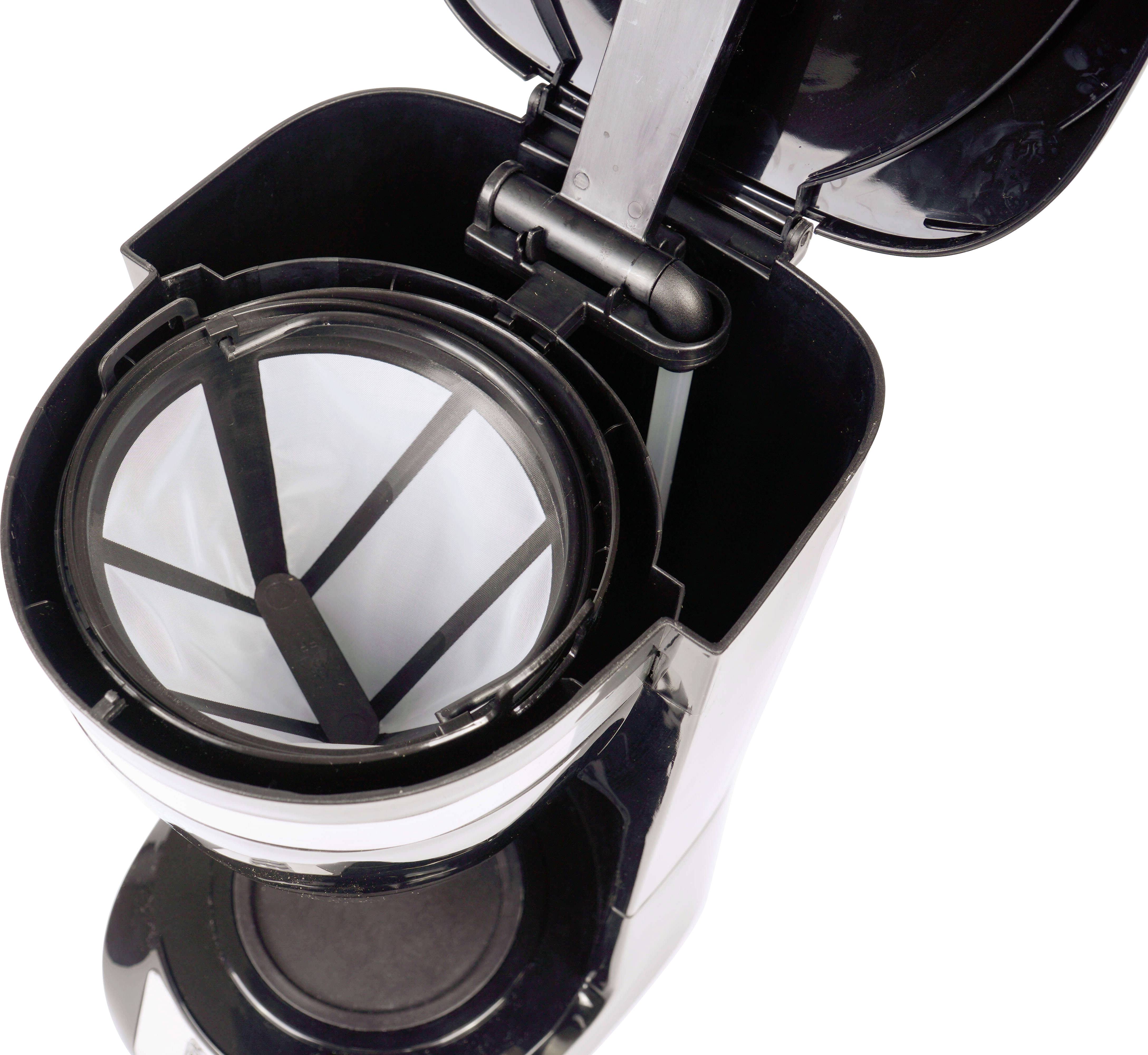 Coffee machine with an open lid, visible filter insert without coffee grounds; viewed from above.