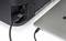 'Back of a printer connected to a laptop via a USB cable. The laptop shows a USB-C port.'