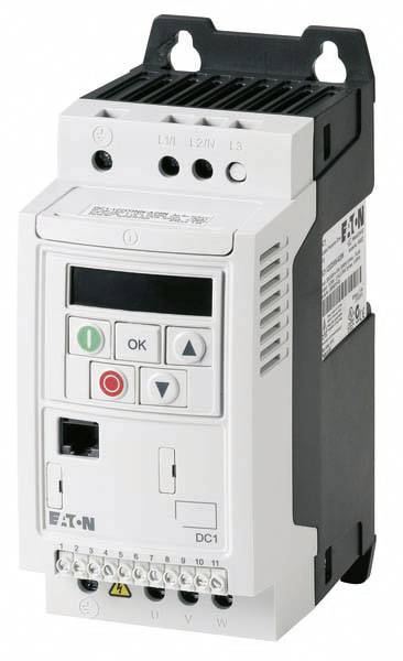 Eaton variable-frequency drive, Model DC1, is used for controlling electric motors. White casing with display and control buttons.