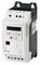 Eaton variable-frequency drive, Model DC1, is used for controlling electric motors. White casing with display and control buttons.